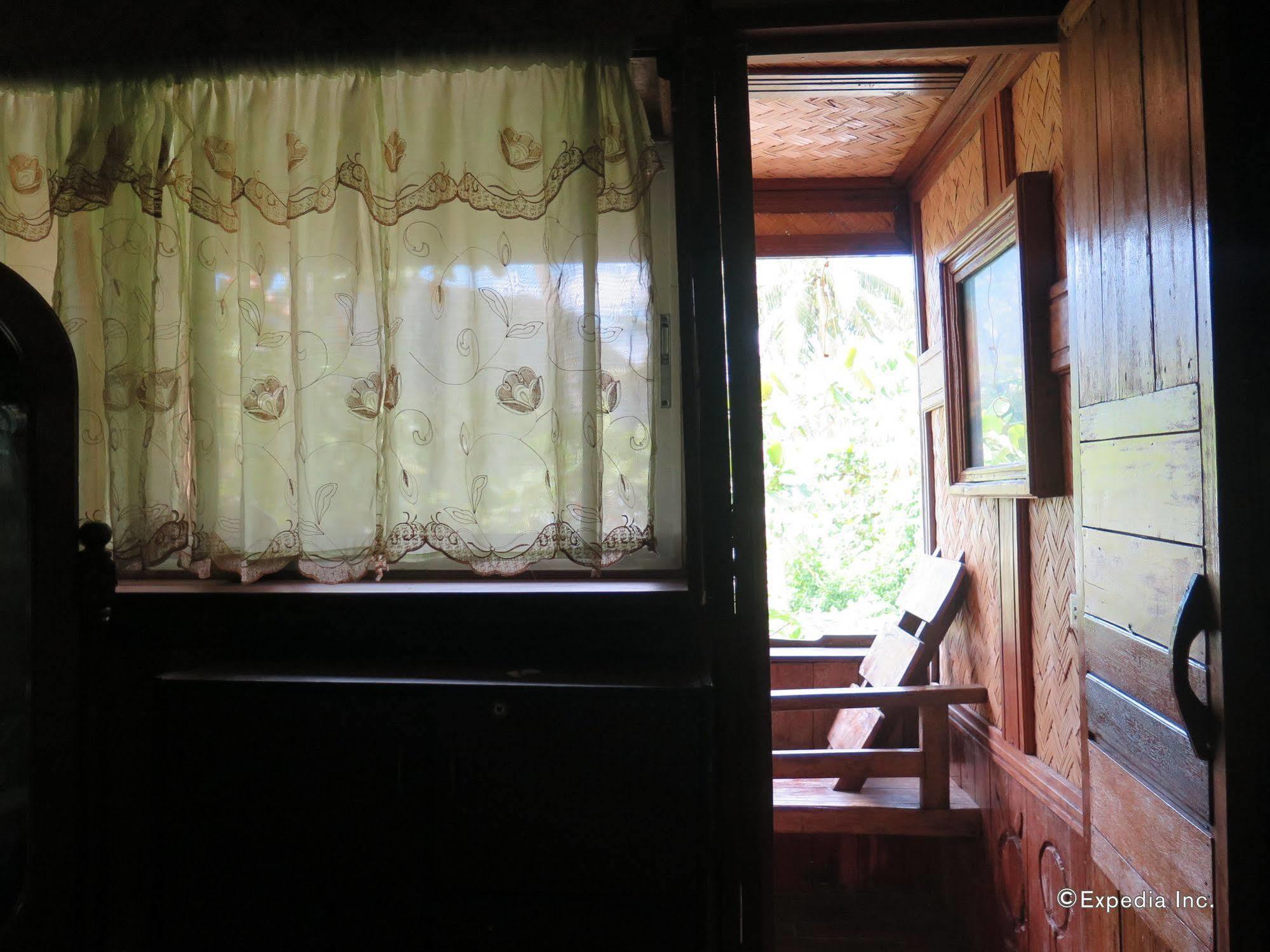 Islandfront Cottages And Restaurant Эль-Нидо Экстерьер фото